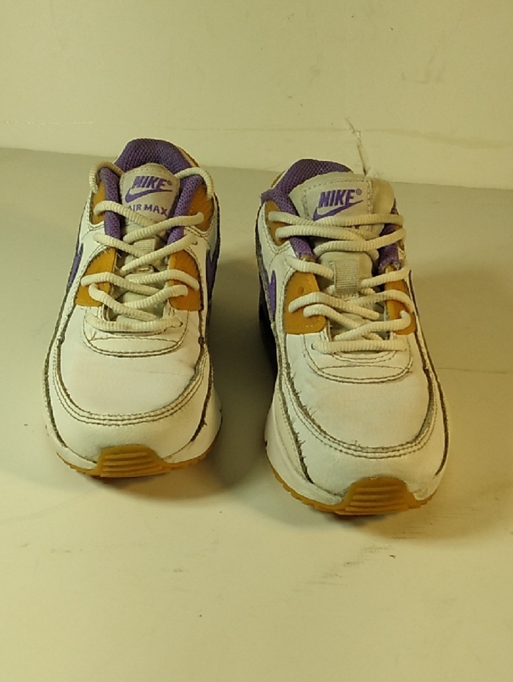 Nike Kids White Sneakers with Purple & Yellow Accents Size Kids 13C.